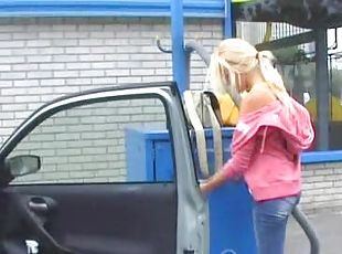 Lovely and innocent blondie Sophie is washing her car