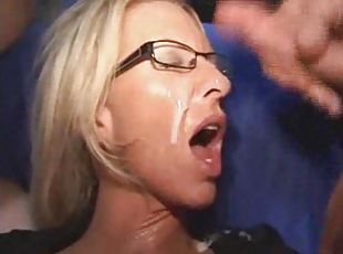 Milf in glasses is soaked in cum