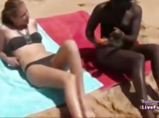Guy fucks black and white girls on the beach