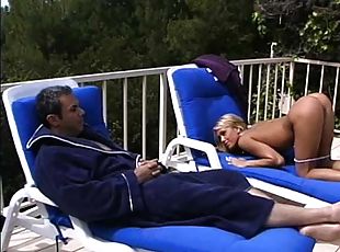 Missionary pounding for a blonde babe near the pool