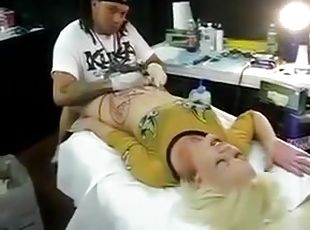 Girl get her pussy tattoo