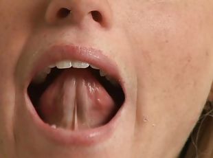 Sexy woman shows of her mouth for some naughty work