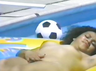 Horny Latina rubs her cunt with a toy on the poolside
