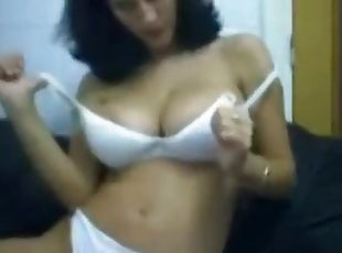 Busty brunette babe on webcam teasing and seducing with her sexy bo...
