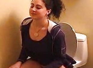 Sexy Turkish girl is taking shit on a hidden camera