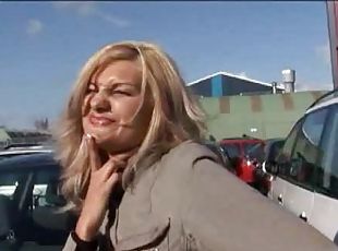 Busty Blonde MILF Sucks Cock in a Car Garage