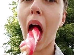 Licking that ice cream, wishing it was you.