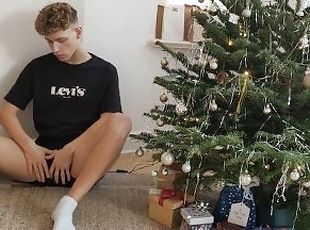 Jakob jerks his uncut cock under the Christmas tree and squirts his...