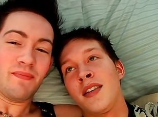 Hot young guys look sexy kissing in bed