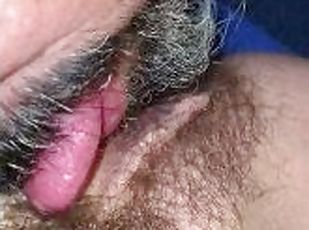 Licking sucking and tugging on the hairy pussy of my hotwife while ...