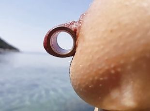 nippleringlover nude beach tunnels in pierced nipples stretching pi...