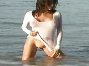 Erika Michelle Barre Shows Her Big Tits After Soaking Her Shirt With Sea Water
