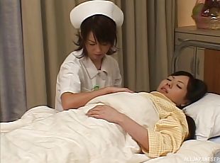 Naughty Japanese nurse seduces her patient into a heated lesbians action