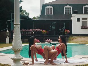 These two ladies were enjoying a day by the pool when things became heated and they began fucking
