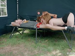 Two Army nurses share his huge cock in a tent