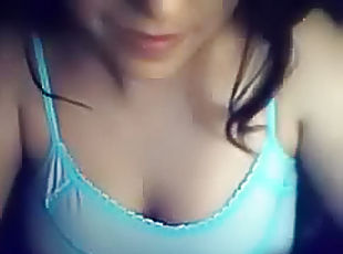 Webcam girl fondles big tits