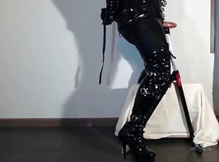 Horny shemale in PVC desperately trying to cum with her hands tied ...