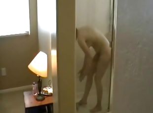 Amateur filmed in the shower as he strokes dick