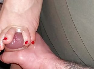 Throbbing cock spits between my toes