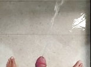 Standing piss naked in the shower, playing with my cock and my piss...