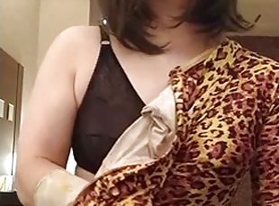 Japanese crossdresses  wearing leopard Morphsuit