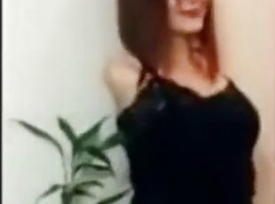 Hot redhead amputee woman dances sexy without arms