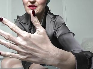 Long dark red nails and fist hand