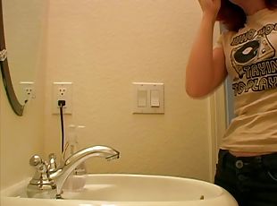 Cute And Sexy Redhead Gets Filmed Putting On Her Make Up