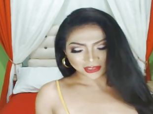 Asian tranny beauty strokes her cock wildly