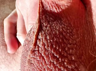 Close-up testicles massaging until big cumshot