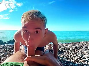 Skinny Twink Sucks off a Big Dick of a Stranger Jerking off on a Beach