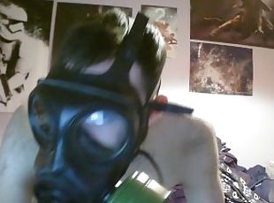 Young hot gimp gearing up in full rubber