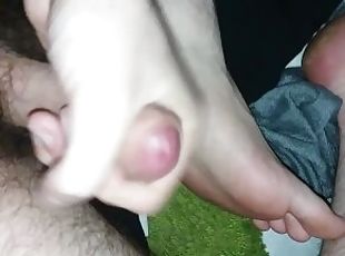 Jerking-off with my foot. Cumshot on my soles