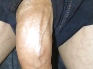 Relaxing growing small limp uncircumcised cock, slowly growing and then resting again with precum