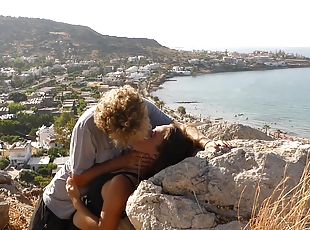 Beautiful Teen Couple In Love Passionately Kissing Above The Sea On...