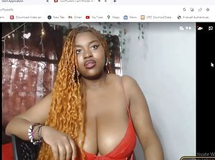 Ebony with big tits has fun on webcam