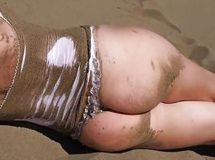 Sexy woman with a dirty pussy at a secluded beach with see through ...