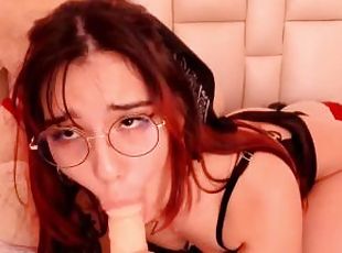 Redhead with glasses gives a blowjob to her dildo so you can imagin...