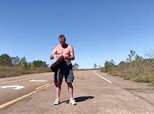 Stripping naked on a public road and jacking off before getting dre...