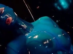 Heavy rubber goddess with big tits in transparent blue latex catsuit and mask masturbates - part 1