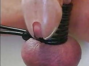 Milking by estim in chastity cage