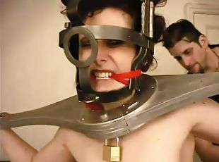 A master puts his slave in a variety of exotic torture devices