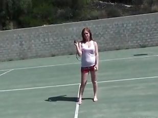 Sporty redhead hottie shows sexy tits outdoor