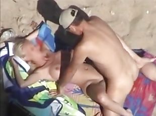 Amateur blond gets fucked in missionary pose on a beach
