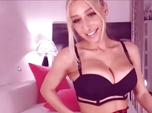 Big-breasted blond bombshell gives a webcam performance
