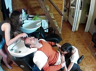 Yummy Brunettes Serve A Blowjob To A Guy While He Gets His Hair Done