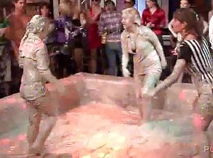 Hot lesbos show their mud covered bodies at a sex party