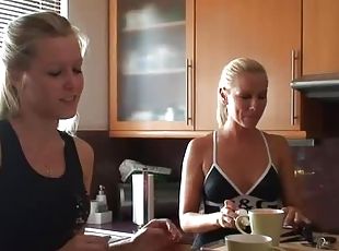 Two blondes Sandy and Sophie talking in the kitchen