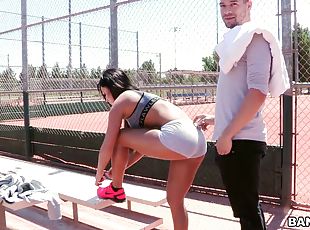 An athletic girl meets a dude in a park and fucks him in a public b...