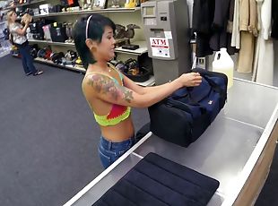 Shorts-clad Asian chick with a hot tattooed body sucking a stranger...